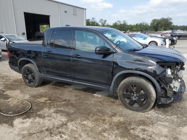 Photo 4 from auction – 2018 HONDA RIDGELINE with VIN 5FPYK3F84JB008561