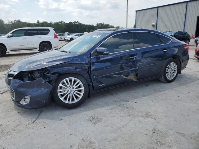 TOYOTA AVALON HYB 2014 with VIN 4T1BD1EB4EU034290 - Photo from auction