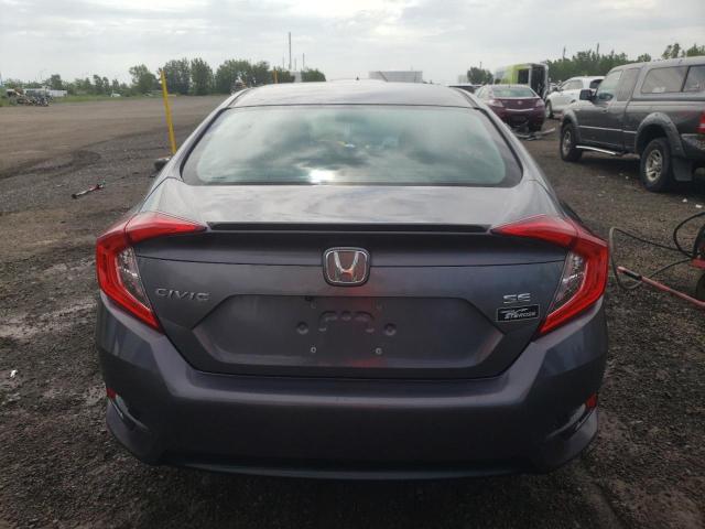 Photo 6 from auction – 2018 HONDA CIVIC LX with VIN 2HGFC2F67JH025906