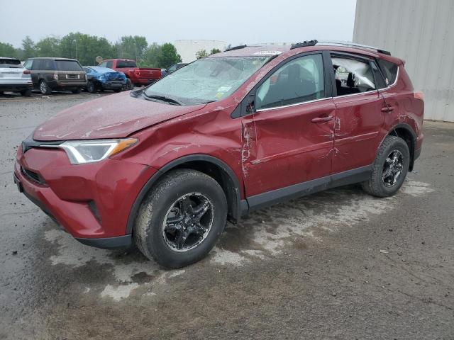 TOYOTA RAV4 LE 2018 with VIN 2T3BFREV8JW854845 - Photo from auction