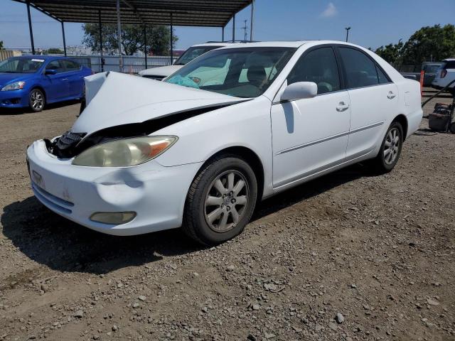 TOYOTA CAMRY LE 2003 with VIN 4T1BF32K23U052777 - Photo from auction