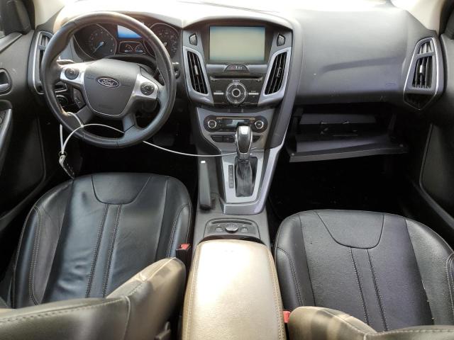Photo 8 from auction – 2014 FORD FOCUS TITA with VIN 1FADP3J28EL228936