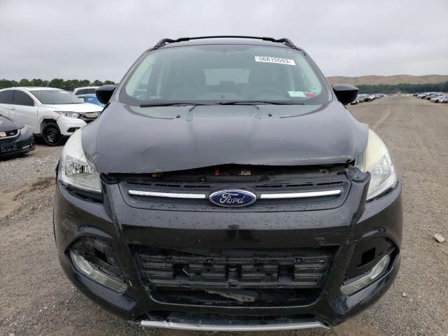 Photo 5 from auction – 2015 FORD ESCAPE SE with VIN 1FMCU9G97FUA34959