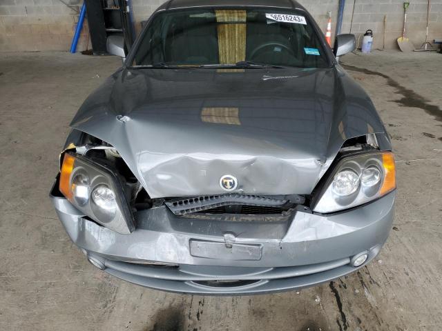 Photo 11 from auction – 2003 HYUNDAI TIBURON with VIN KMHHM65D63U103163