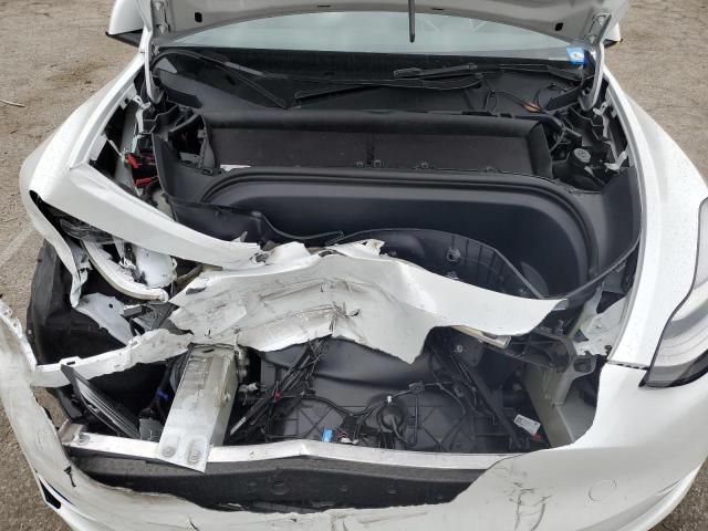 Photo 11 from auction – 2023 TESLA MODEL Y with VIN 7SAYGDEF7PA049534