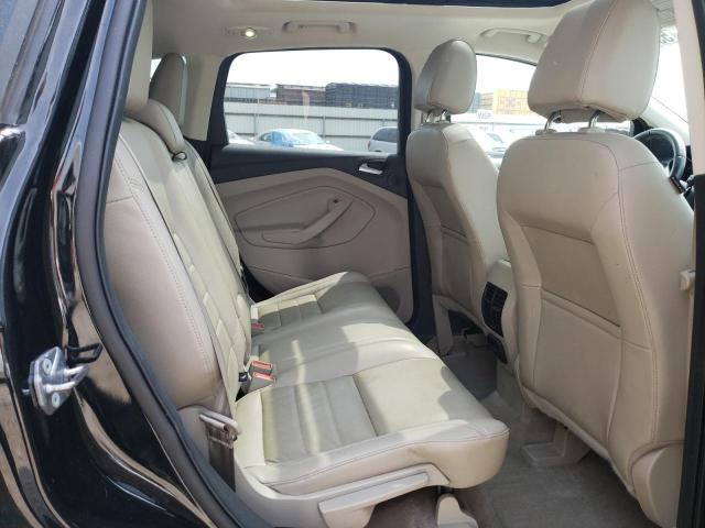 Photo 11 from auction – 2016 FORD ESCAPE TIT with VIN 1FMCU9J93GUB59869