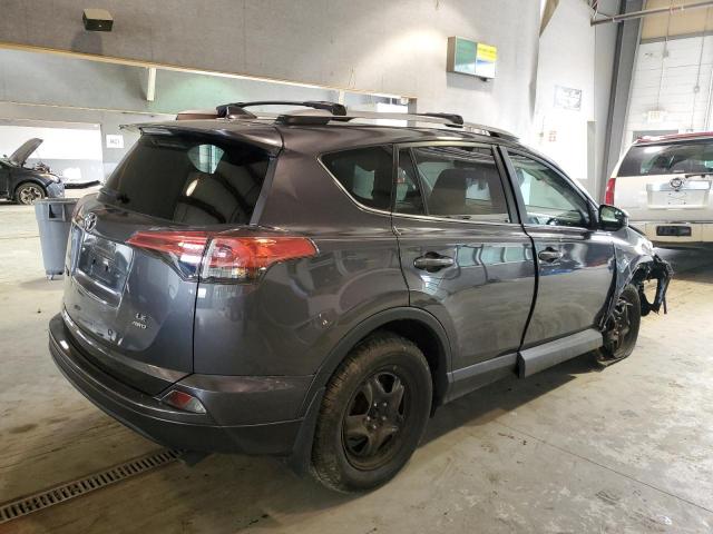 Photo 3 from auction – 2018 TOYOTA RAV4 LE with VIN 2T3BFREV3JW852226