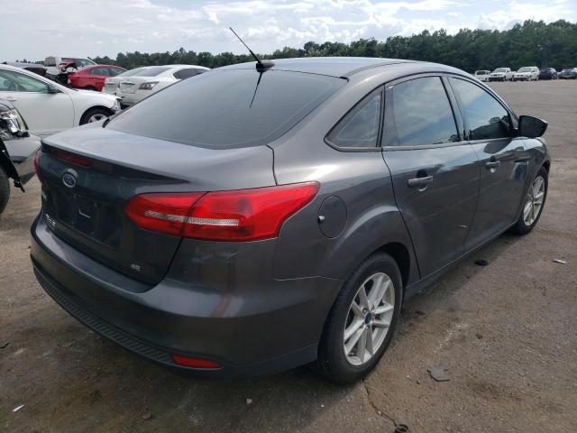 Foto 3 de la subasta – 2018 FORD FOCUS SE con VIN 1FADP3F28JL256223