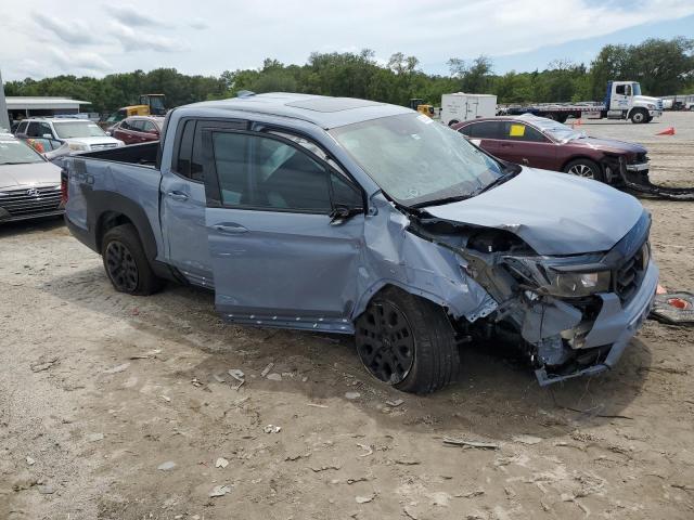 Photo 4 from auction – 2022 HONDA RIDGELINE with VIN 5FPYK3F87NB020838