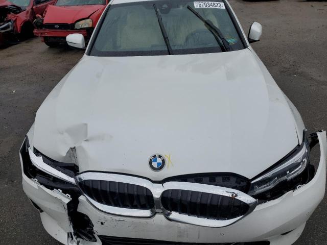 Photo 11 from auction – 2022 BMW 330I with VIN 3MW5R1J08N8C33277