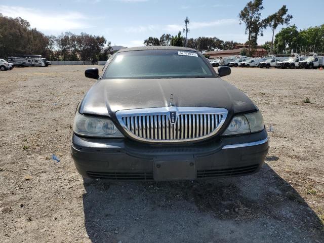 Photo 5 from auction – 2003 LINCOLN TOWN CAR E with VIN 1L1FM81W73Y662788
