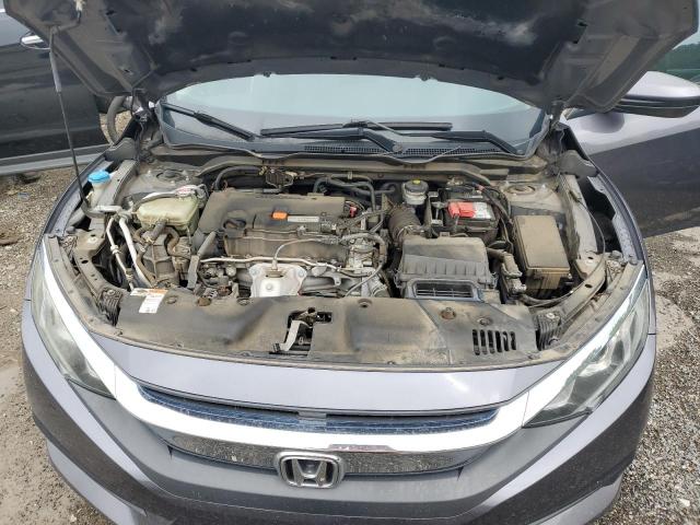 Photo 11 from auction – 2016 HONDA CIVIC LX with VIN 2HGFC2F51GH556079