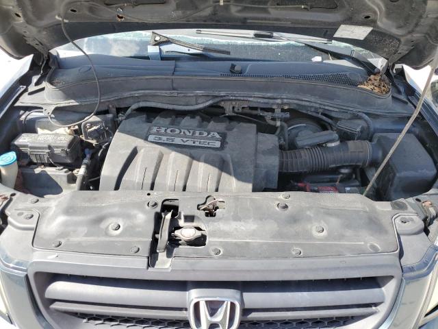 Photo 12 from auction – 2005 HONDA PILOT EX with VIN 2HKYF18435H530049