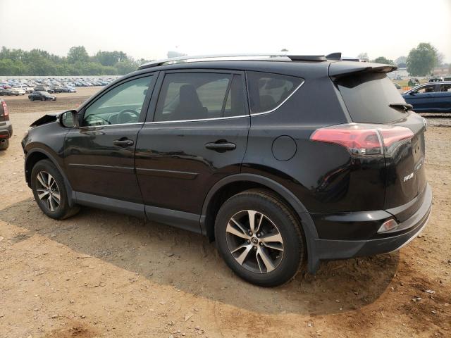 Photo 2 from auction – 2016 TOYOTA RAV4 XLE with VIN 2T3RFREV8GW448443