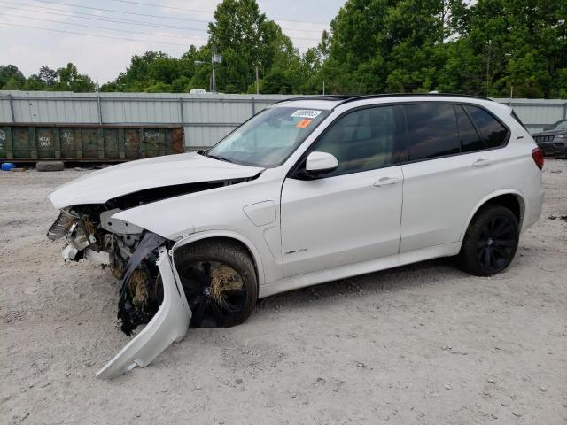 BMW X5 XDR40E 2018 with VIN 5UXKT0C50J0V98940 - Photo from auction
