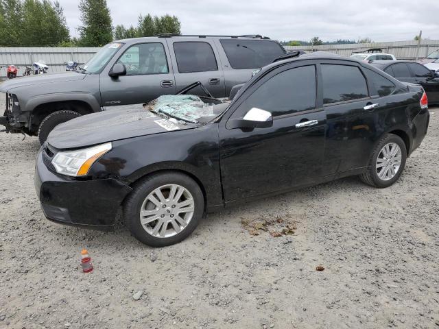 FORD FOCUS SEL 2011 with VIN 1FAHP3HN1BW165500 - Photo from auction