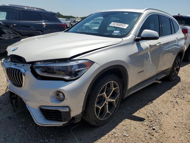 BMW X1 XDRIVE2 2018 with VIN WBXHT3C32J5F91329 - Photo from auction
