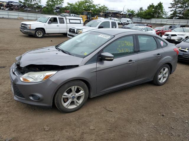 FORD FOCUS SE 2014 with VIN 1FADP3F21EL401804 - Photo from auction