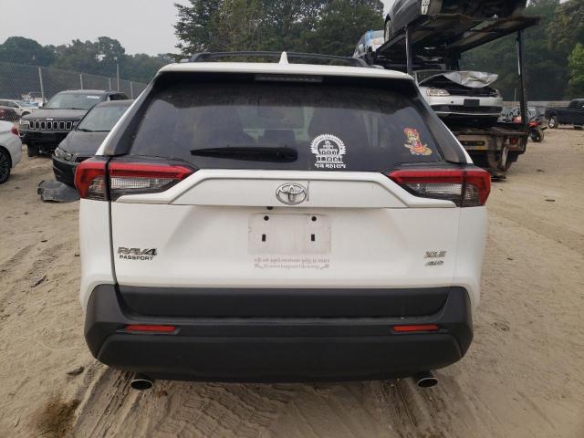 Photo 6 from auction – 2020 TOYOTA RAV4 XLE with VIN JTMP1RFV8LD059118