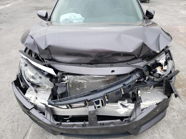 Photo 11 from auction – 2016 HONDA CIVIC LX with VIN 19XFC2F54GE248771