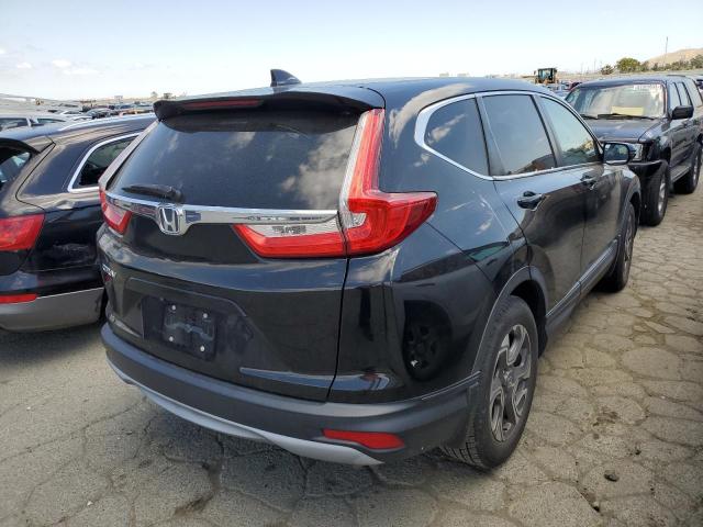 Photo 3 from auction – 2017 HONDA CR-V EX with VIN 7FARW1H55HE029491
