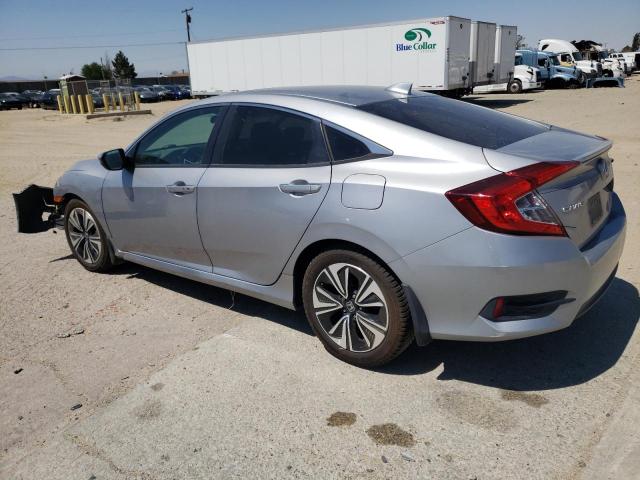 Photo 2 from auction – 2016 HONDA CIVIC EX with VIN 2HGFC1F37GH645549