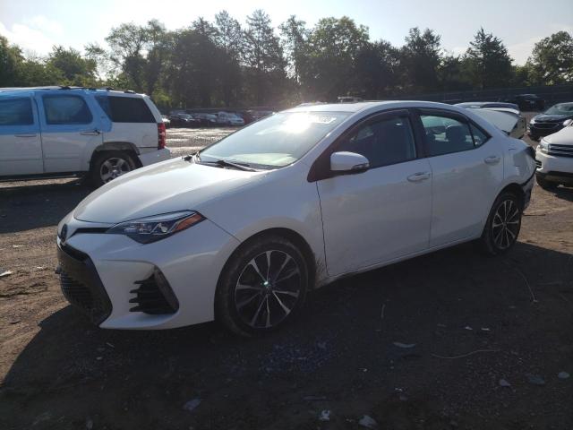 TOYOTA COROLLA L 2017 with VIN 5YFBURHE5HP660635 - Photo from auction