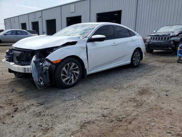 HONDA CIVIC EX 2018 with VIN 19XFC2F72JE036458 - Photo from auction