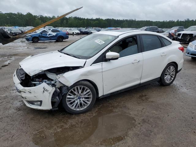 FORD FOCUS TITA 2016 with VIN 1FADP3J29GL334976 - Photo from auction