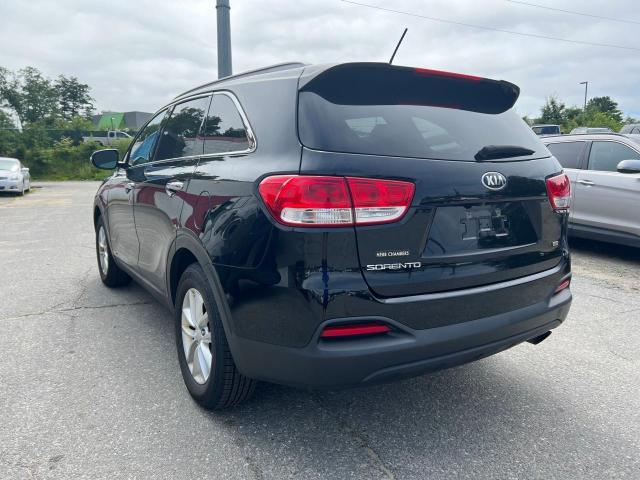 Photo 3 from auction – 2016 KIA SORENTO LX with VIN 5XYPGDA39GG074452