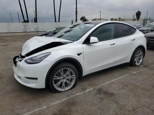 TESLA MODEL Y 2023 with VIN 7SAYGDEF7PA049534 - Photo from auction