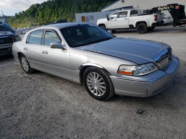 Photo 4 from auction – 2004 LINCOLN TOWN CAR E with VIN 1LNHM81W24Y612048