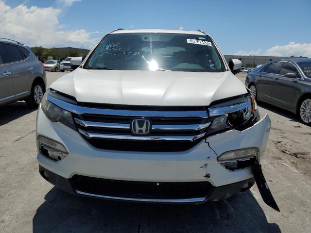 Photo 5 from auction – 2016 HONDA PILOT ELIT with VIN 5FNYF6H00GB052345