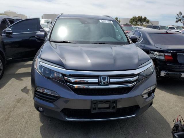 Photo 5 from auction – 2016 HONDA PILOT TOUR with VIN 5FNYF6H97GB082022