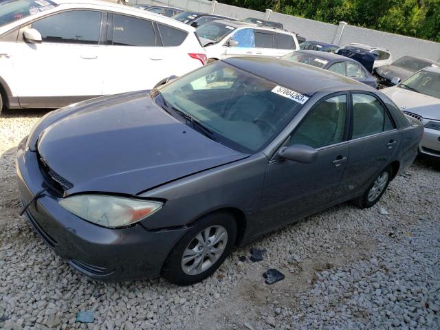 TOYOTA CAMRY LE 2004 with VIN 4T1BF32K44U587384 - Photo from auction