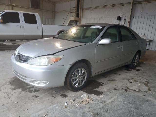 TOYOTA CAMRY LE 2002 with VIN 4T1BE32K22U613173 - Photo from auction