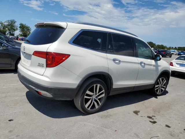 Photo 3 from auction – 2016 HONDA PILOT ELIT with VIN 5FNYF6H00GB052345