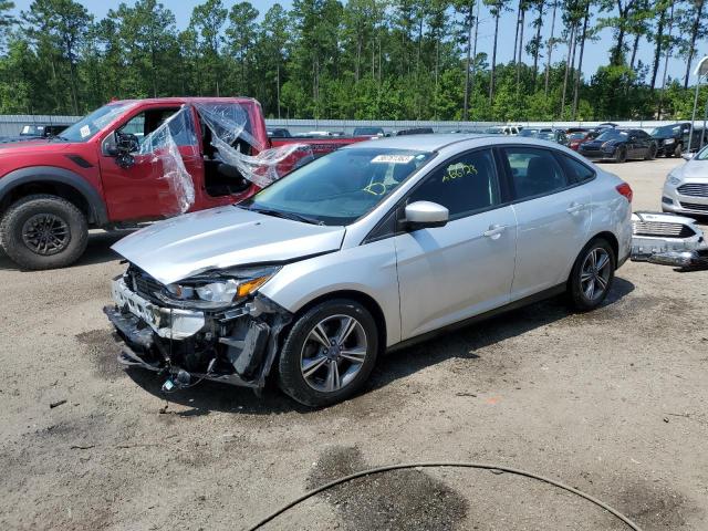 FORD FOCUS SE 2018 with VIN 1FADP3FE4JL282313 - Photo from auction