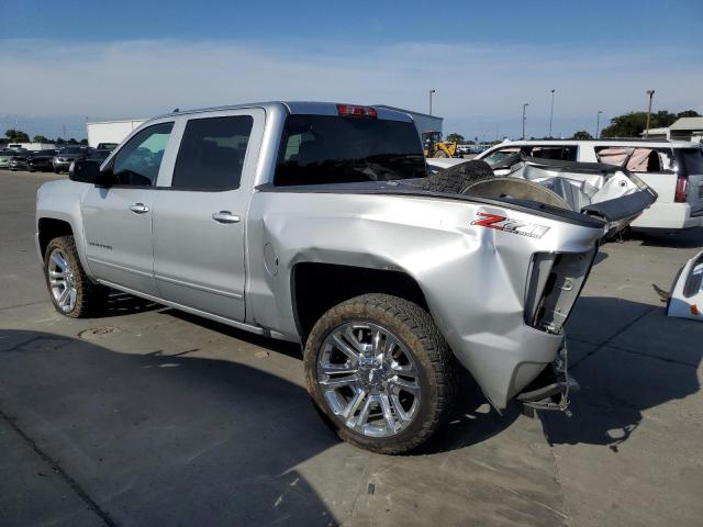 Photo 2 from auction – 2018 CHEVROLET SILVERADO with VIN 3GCUKREC6JG464166
