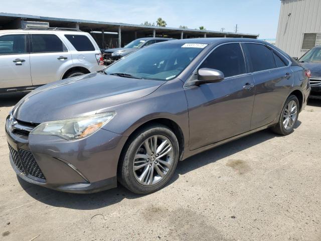 TOYOTA CAMRY LE 2016 with VIN 4T1BF1FK6GU524273 - Photo from auction