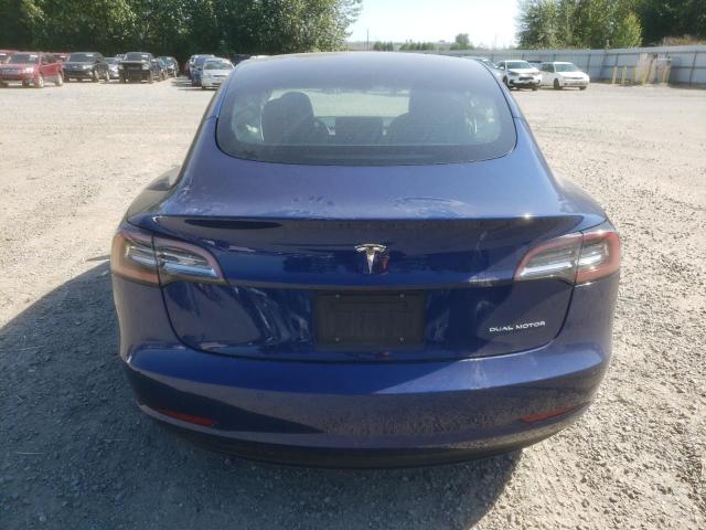 Photo 6 from auction – 2021 TESLA MODEL 3 with VIN 5YJ3E1EB8MF997769