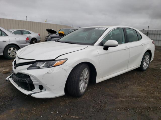 TOYOTA CAMRY LE 2020 with VIN 4T1C11AK2LU898027 - Photo from auction