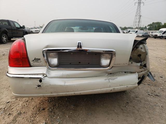 Photo 6 from auction – 2004 LINCOLN TOWN CAR U with VIN 1LNHM83W04Y663786