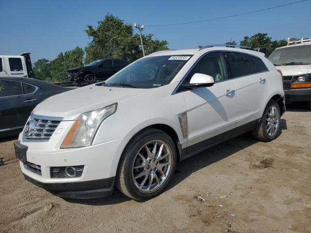 CADILLAC SRX PERFOR 2013 with VIN 3GYFNHE3XDS529025 - Photo from auction