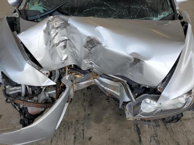 Photo 11 from auction – 2011 HONDA CIVIC LX with VIN 2HGFA1F58BH303480