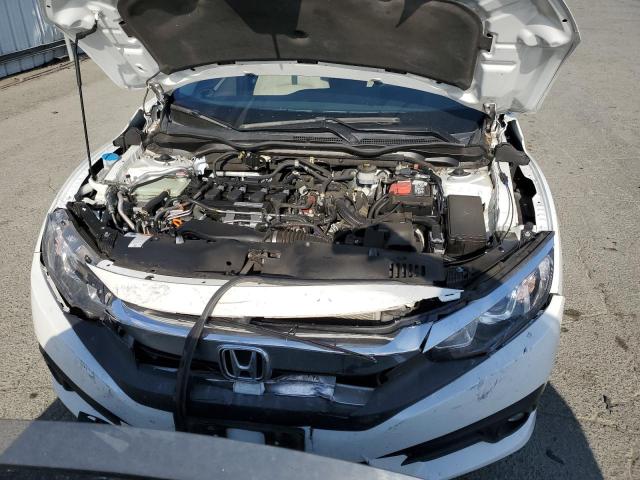 Photo 11 from auction – 2018 HONDA CIVIC EX with VIN JHMFC1F39JX040612