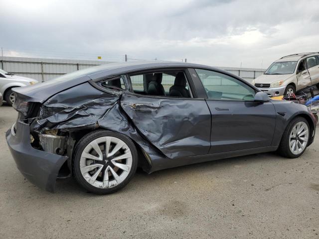 Photo 3 from auction – 2022 TESLA MODEL 3 with VIN 5YJ3E1EB9NF144640