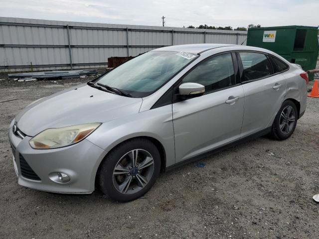 FORD FOCUS SE 2014 with VIN 1FADP3F21EL230696 - Photo from auction