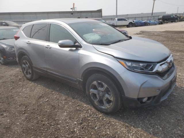 Photo 4 from auction – 2018 HONDA CR-V EX with VIN 7FARW2H56JE044268