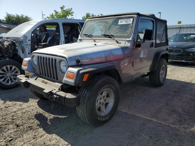 JEEP WRANGLER / 2000 with VIN 1J4FA49S4YP720899 - Photo from auction
